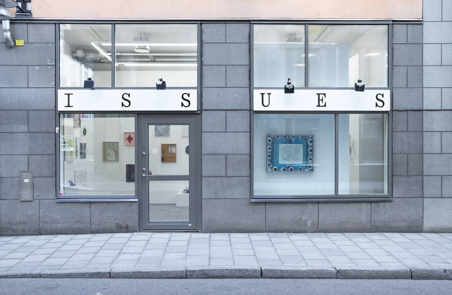Downtown Issues III, storefront